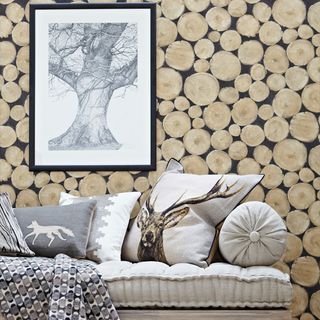 wood wallpaper with deer print cushion and fox print cushion