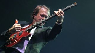 Mark King of Level 42 performs on stage, playing slap bass on a headless bass guitar, at the Royal Albert Hall on October 28, 2012 in London, United Kingdom.