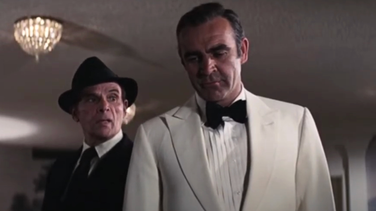 Marc Lawrence speaking with Sean Connery in a Vegas hotel room in Diamonds Are Forever.