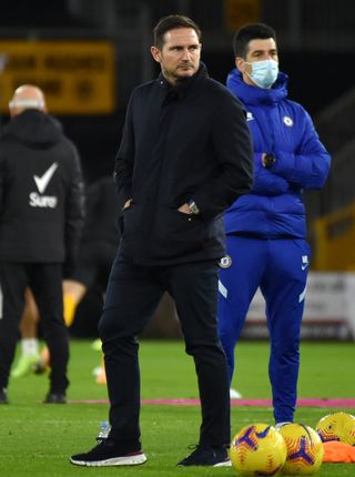 Frank Lampard watched the players warm-up at Wolves