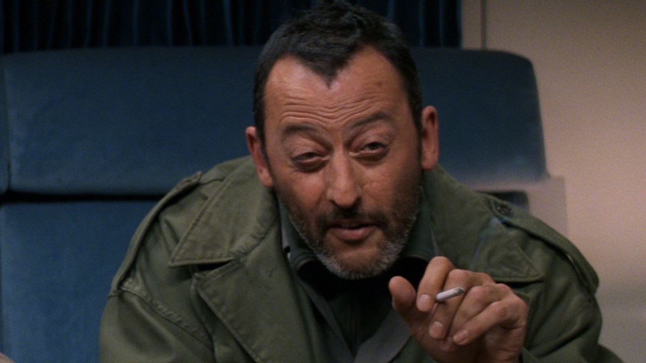 Jean Reno pointing with cigarette in Mission: Impossible