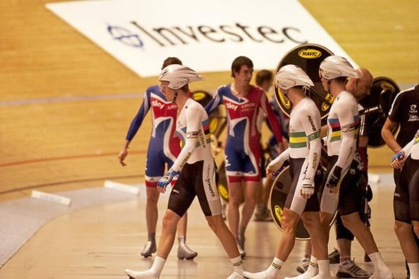 The Australian team make their way to the startline for the gold medal ride as the Great Britain riders head off after winning the bronze medal.
