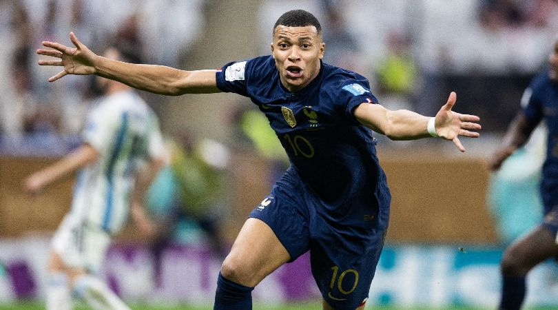 Kylian Mbappe celebrates after scoring his second goal for France against Argentina in the 2022 World Cup final.