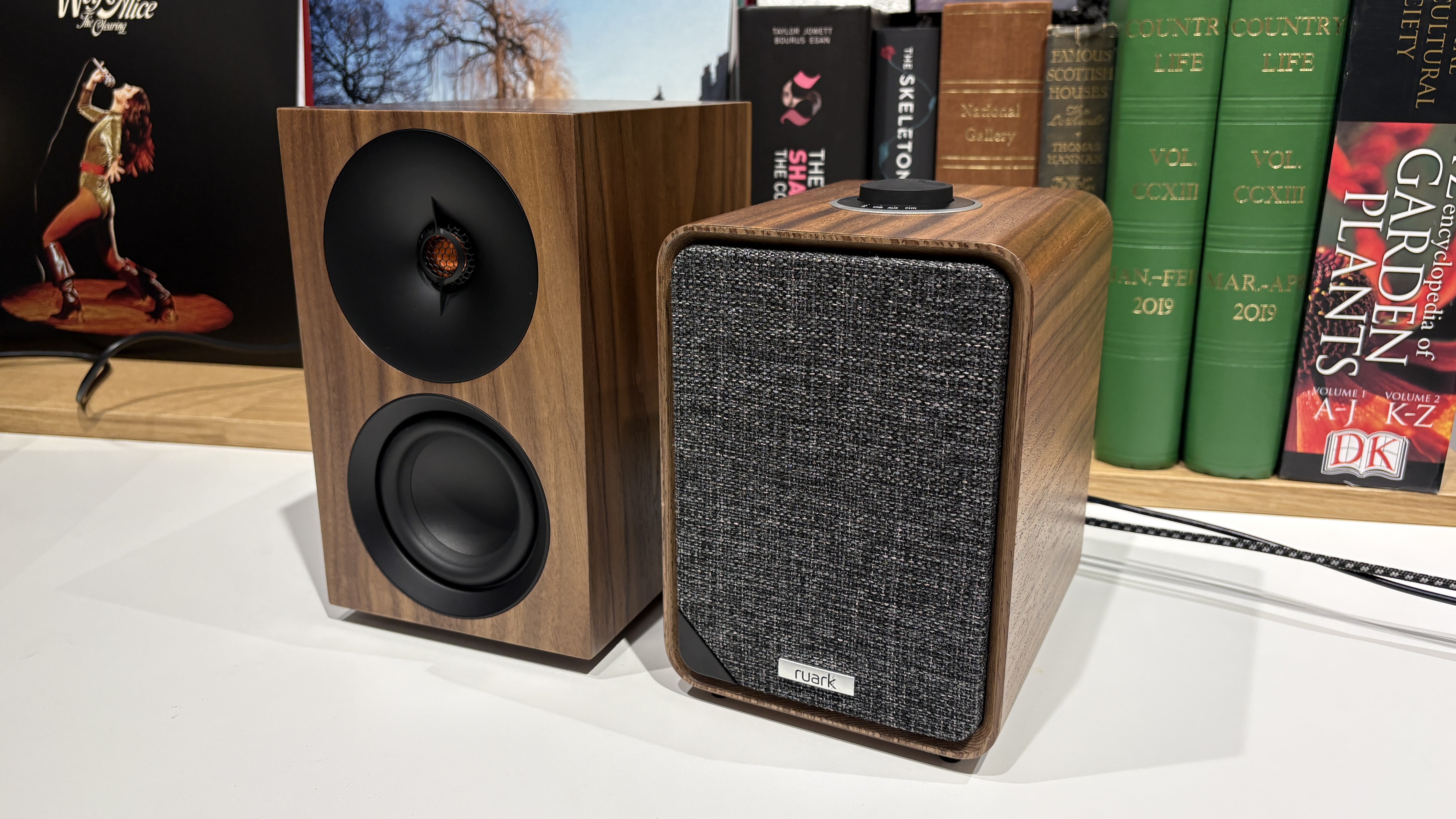 Ruark MR1 Mk3 and Cambridge L/R S speakers side-by-side on white table