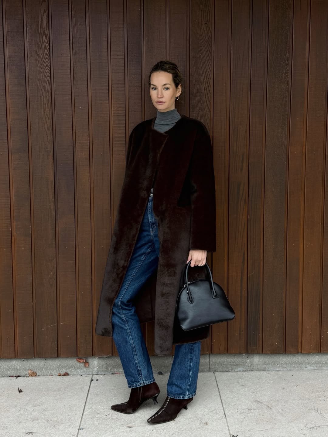 influencer wearing a faux-fur coat