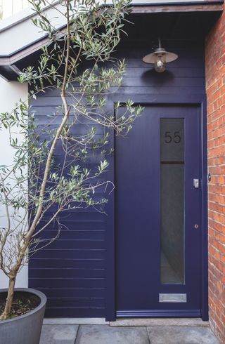 Front door painted in Scotch Blue exterior eggshell by Farrow & Ball