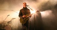 Josh Homme of Queens of the Stone Age performs onstage in 2025.