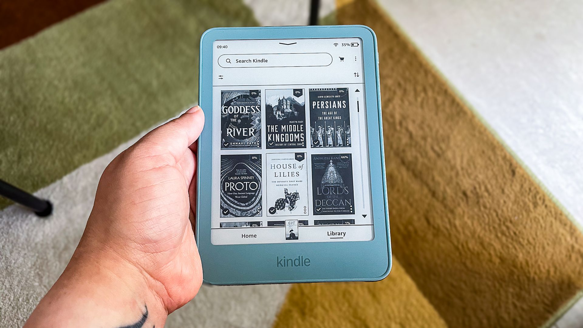 The Library tab on the Amazon Kindle 2026 showing tiles of book covers