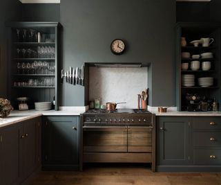 Dark kitchen with grey walls and cabinets