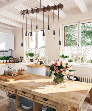 Kitchen with wooden table and flowers