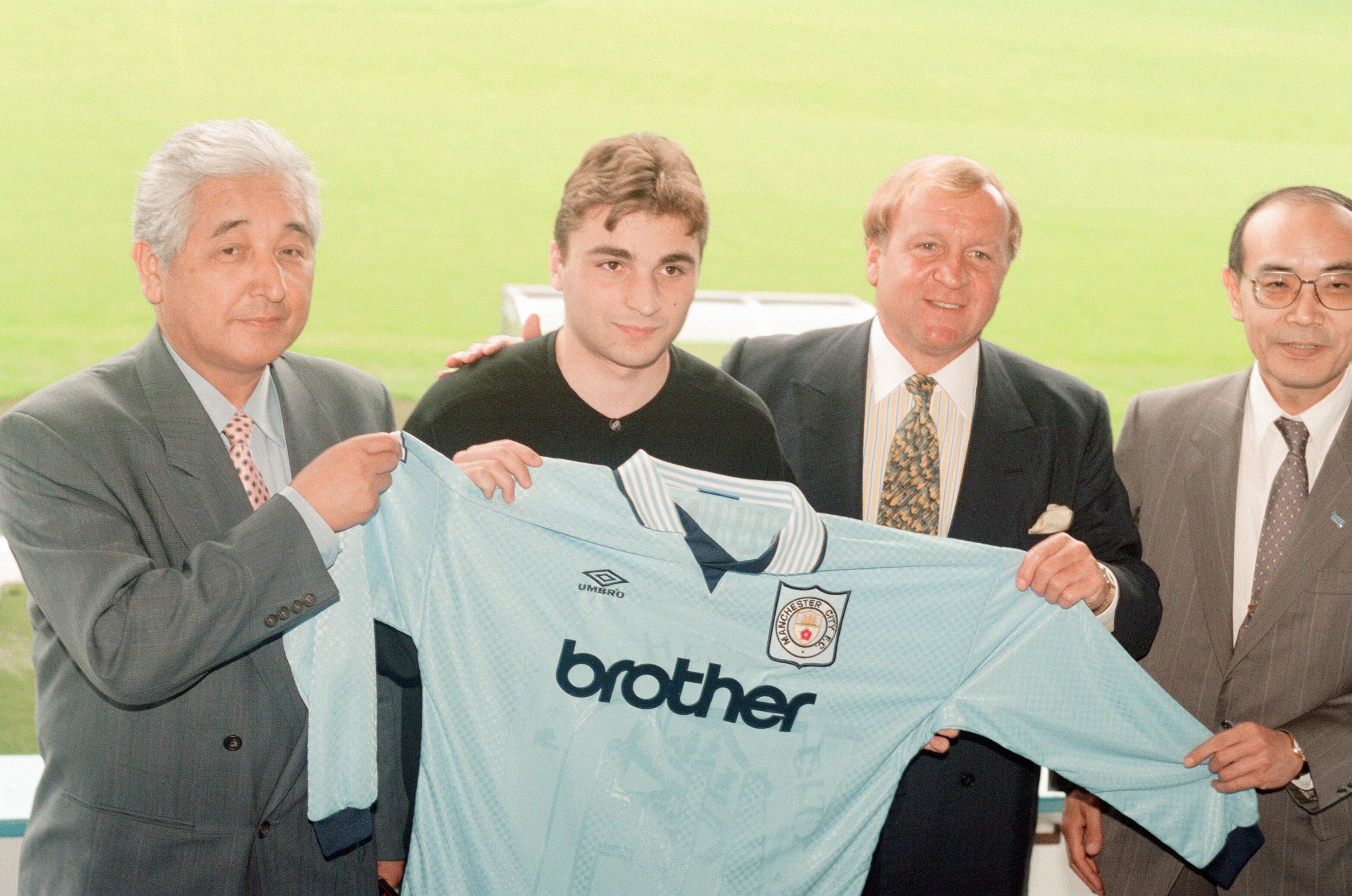 Georgi Kinkladze, Manchester City midfielder, photocall with new shirt sponsor, Brother, at Maine Road, Tuesday 11th June 1996. (Photo by Dennis Hussey/Mirrorpix/Getty Images)