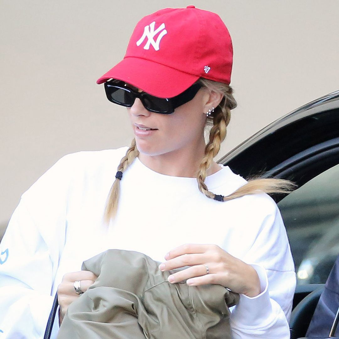 Margot Robbie was spotted in L.A. wearing black leggings and Loewe ballet sneakers