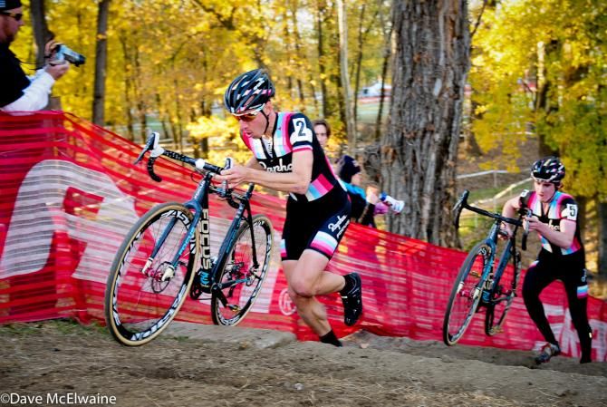Jeremy Powers (Rapha Focus) running the stairs with his teammate Zach McDonald