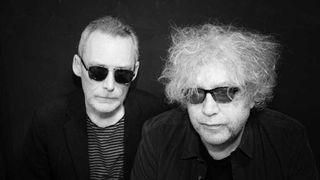 A portrait of the jesus and mary chain in black and white