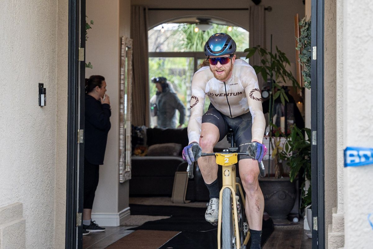 2022 runner-up John Borstelmann rides through a house, which was part of this year's course