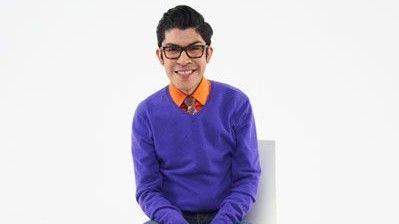 Mondo Guerra in purple sweater