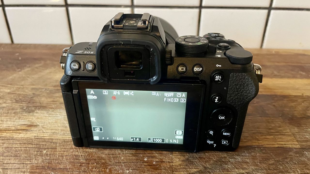 Nikon Z50 II mirrorless camera on a wooden tabletop