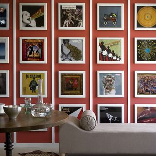 frames on red wall