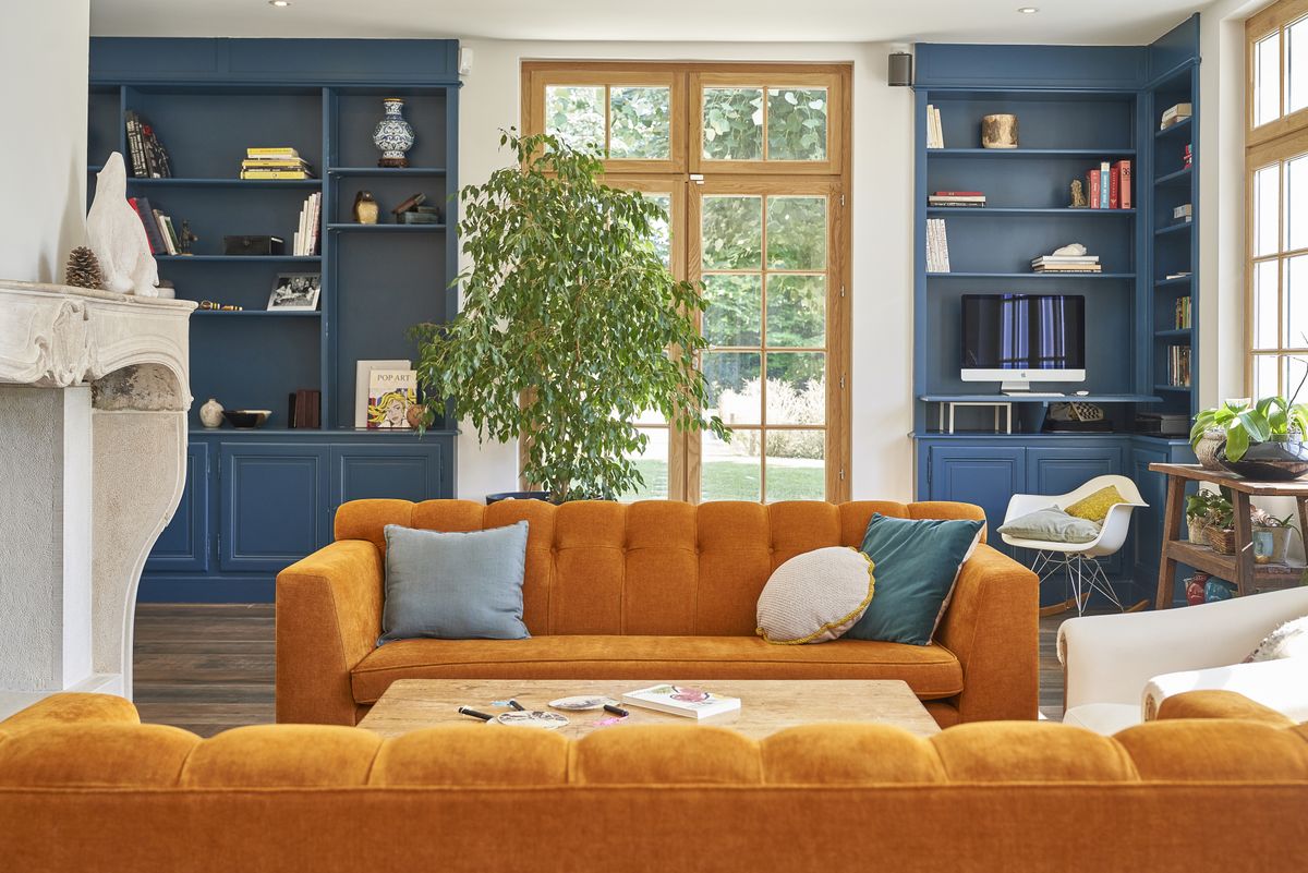 10 living rooms with colorful couches that prove being bold with your sofa choice is the best investment you can make