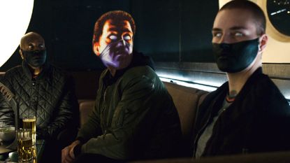 A photo illustration with a Syndicate agent's head on a Mute Syndicate body.