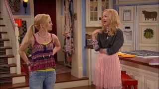 Dove Cameron looking at Dove Cameron in Liv and Maddie.