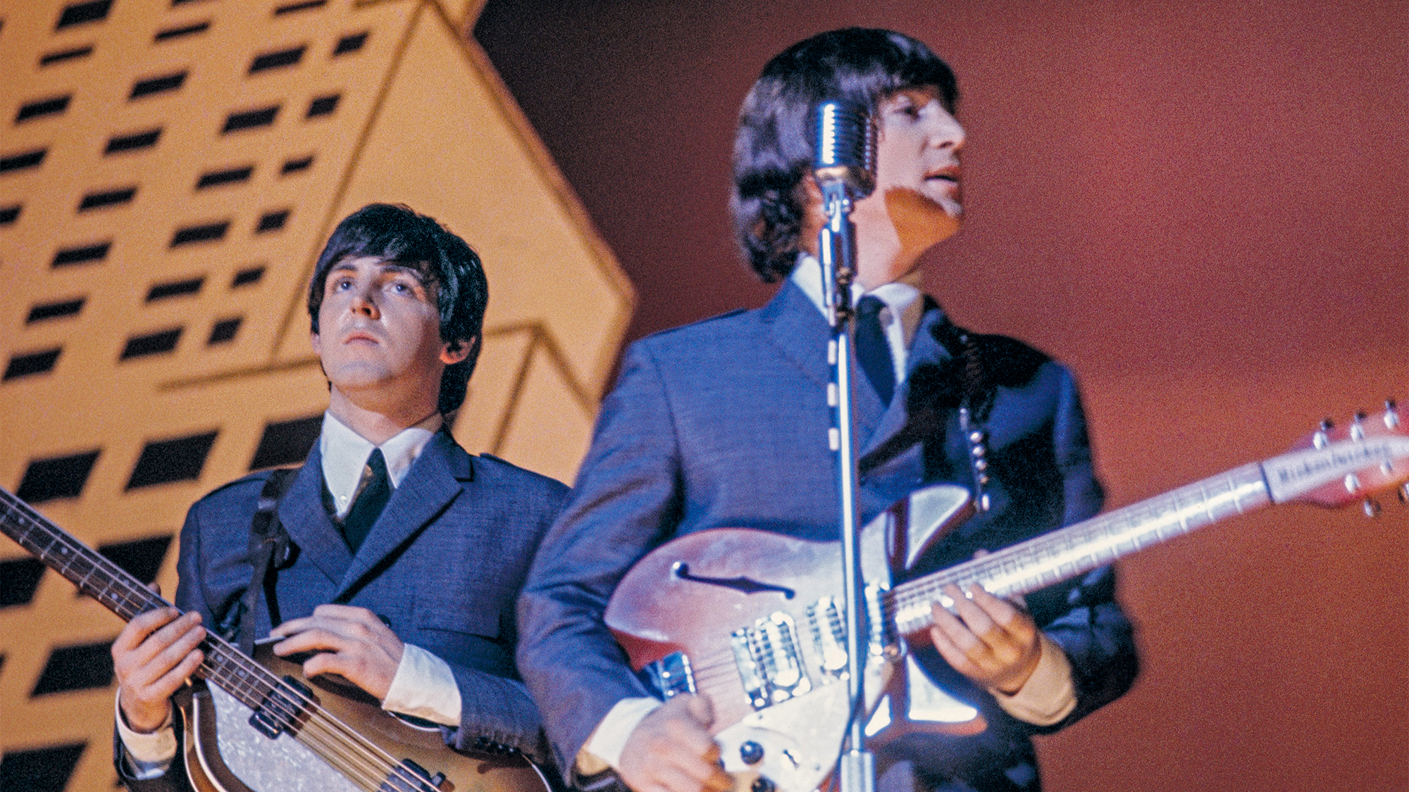 Paul McCartney (left) and John Lennon (1940 ? 1980) performing with The Beatles during their American tour, August 1965. 