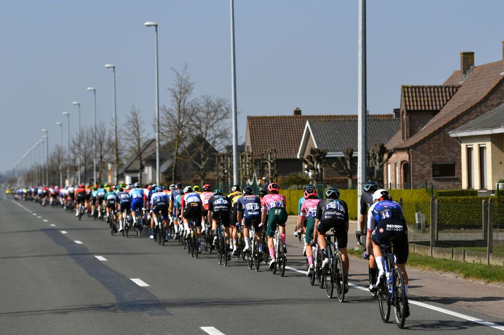 DE PANNE BELGIUM MARCH 23 A general view of the peloton competing during the 46th Minerva Classic Brugge De Panne 2022 a 2079km stage from Brugge to De Panne MinervaClassic on March 23 2022 in De Panne Belgium Photo by Luc ClaessenGetty Images