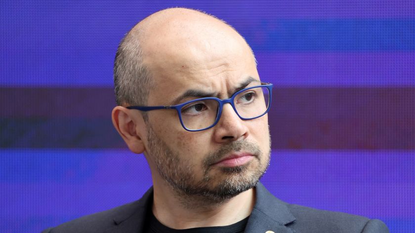 CEO of DeepMind Technologies Demis Hassabis listens during a debate at an AI summit at Imperial College London, in central London on July 9, 2025.