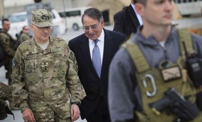 Secretary of Defense Leon Panetta speaks with Lieutenant General Curtis Scaparrotti during his visit in Kabul