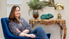 Monica Vinader in a blue armchair