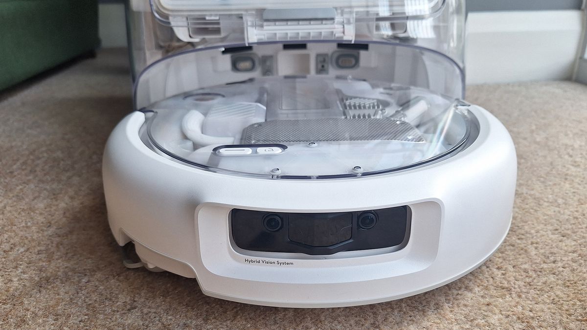 DJI's second-gen Romo robot vacuum looks like the lovechild of an HR Giger drawing and an iMac G3 — and boasts some robust new privacy measures following the first-gen model's hacking embarrassment