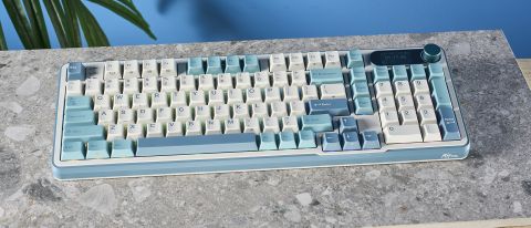 A Royal Kludge S98 wireless mechanical keyboard with blue, teal and white double-shot ABS keycaps