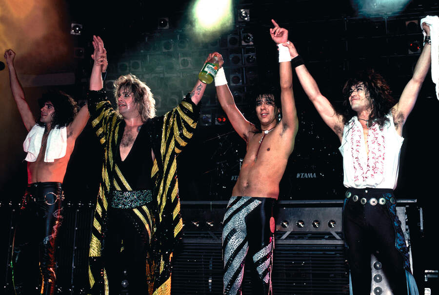 Ozzy Osbourne and his band take a bow after a performance at the Poplar Creek Music Theater in Hoffman Estates, Chicago, Illinois, July 13, 1986