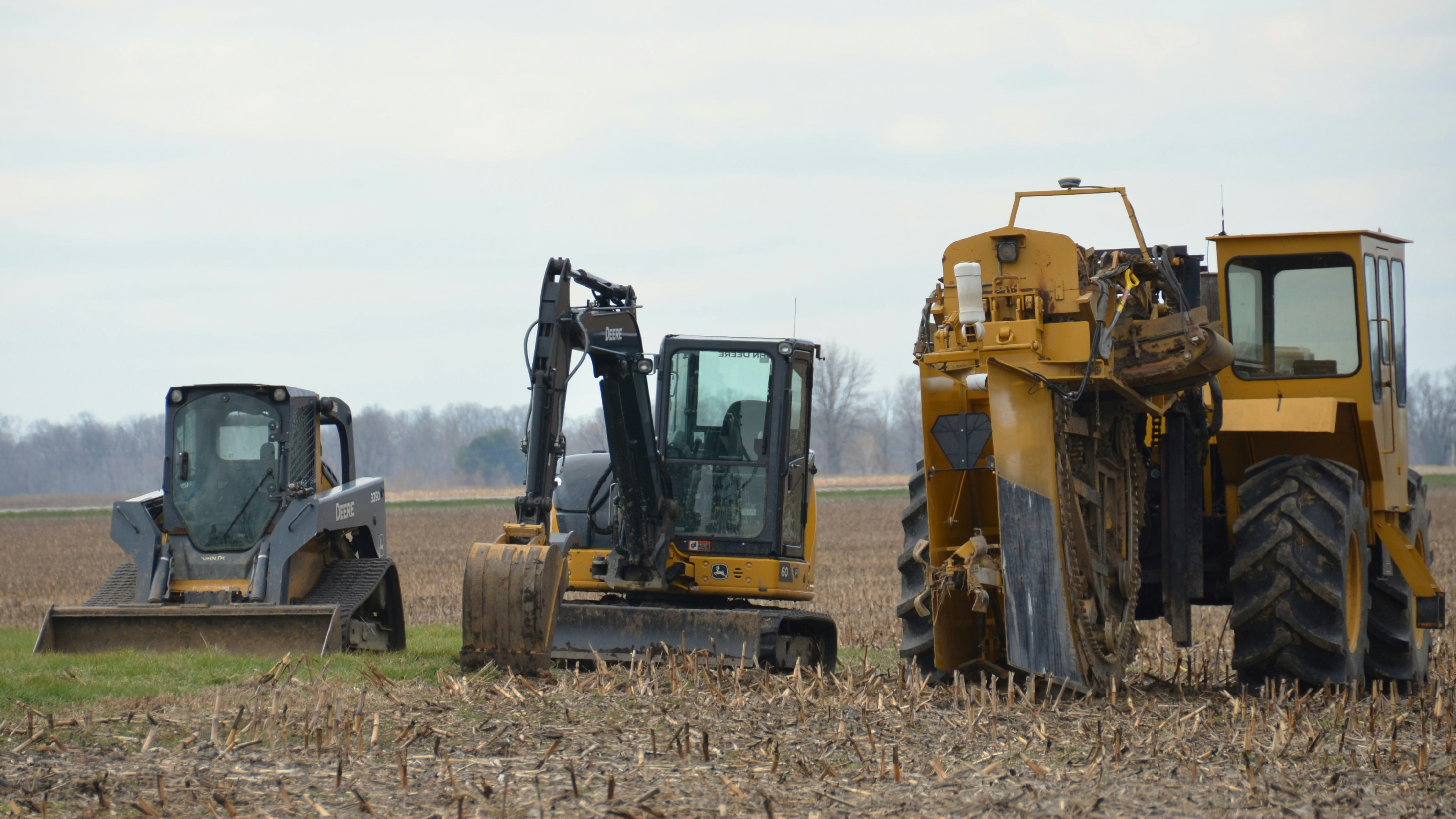 Skid steer in field