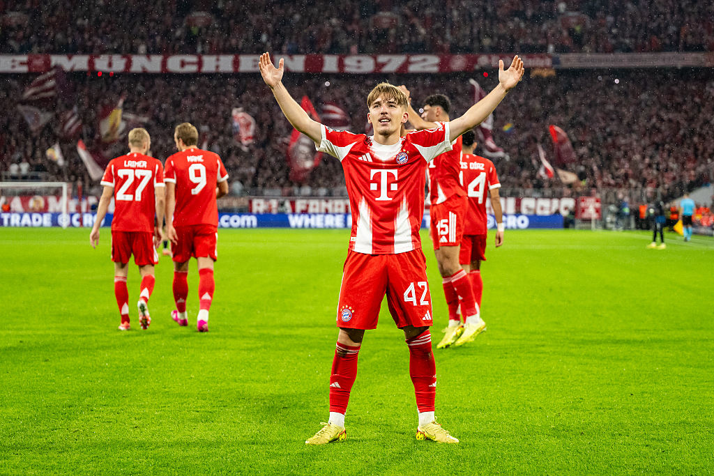 Lennart Karl of FC Bayern Muenchen celebrates after scoring his team's first goal during the UEFA Champions League 2025/26 League Phase MD3 match between FC Bayern München and Club Brugge KV at Football Arena Munich on October 22, 2025 in Munich, Germany.