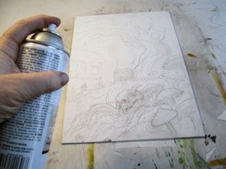 Drawing being sprayed with a can of fixative