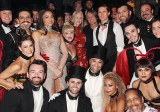 Nicole Kidman and Keith Urban pose backstage with the cast of "Moulin Rouge" on Broadway at The Hirshfeld Theatre on August 9, 2019 in New York City.