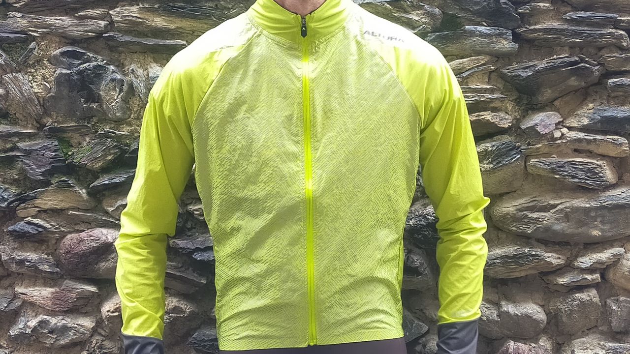 Image shows a rider wearing the Altura Icon Rocket Men&#039;s Packable Jacket.