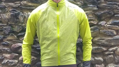 Image shows a rider wearing the Altura Icon Rocket Men's Packable Jacket.