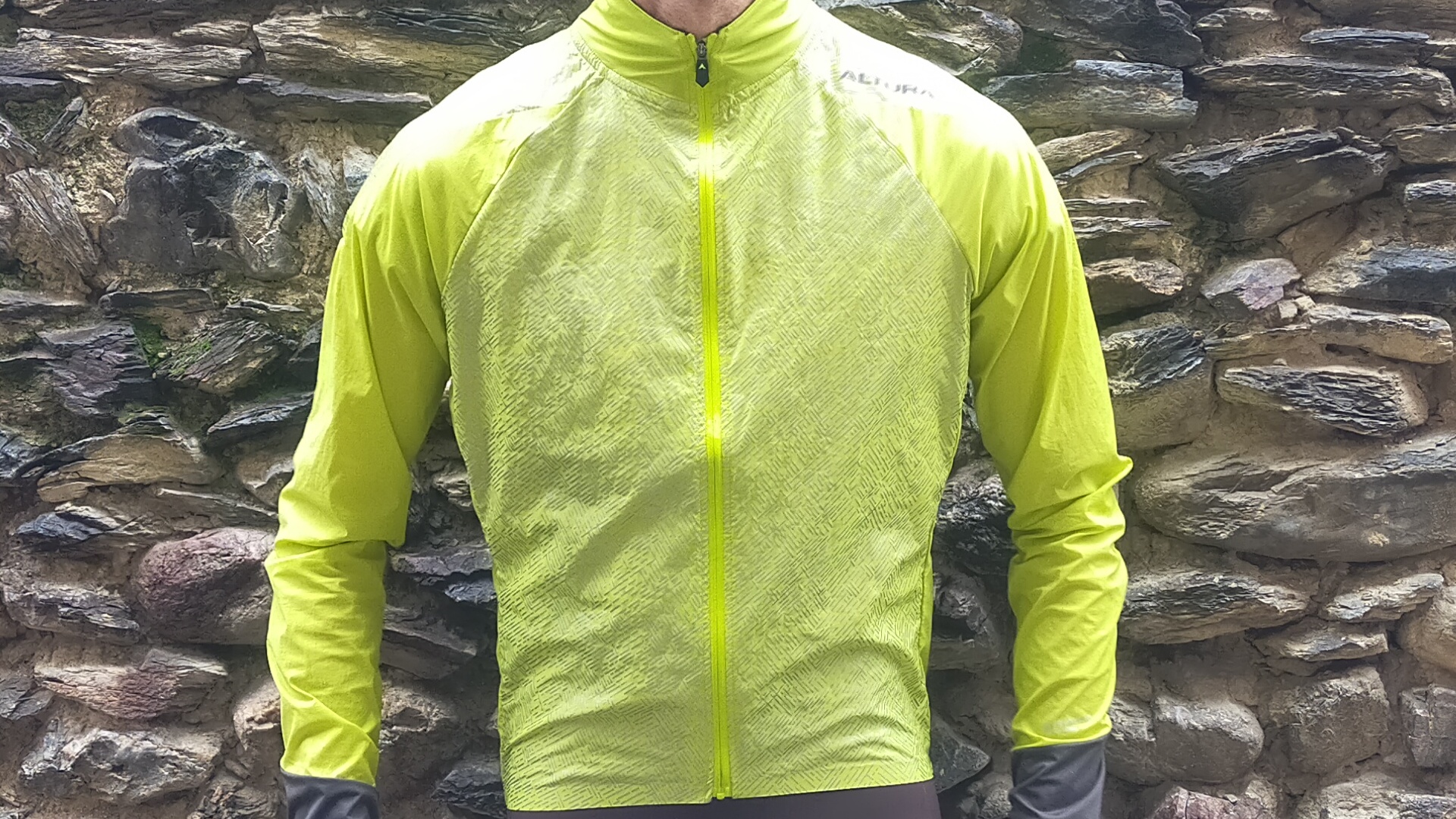 A rider wearing the Altura Icon Rocket Men's Packable Jacket