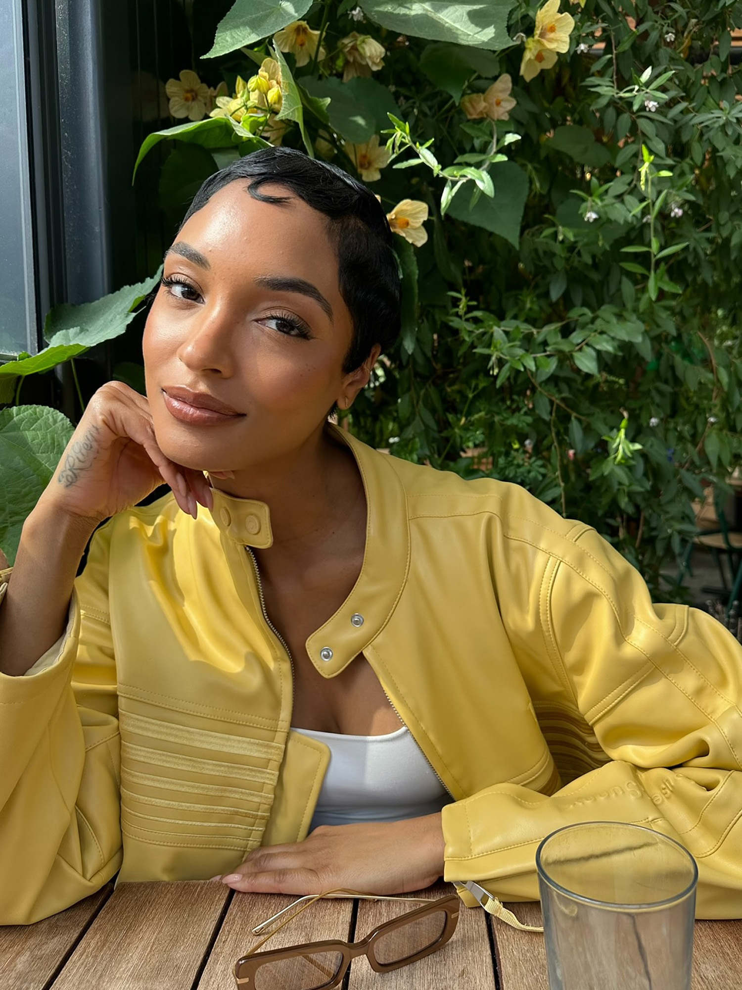 Jourdan Dunn wears a classic pixie cut with kiss curls