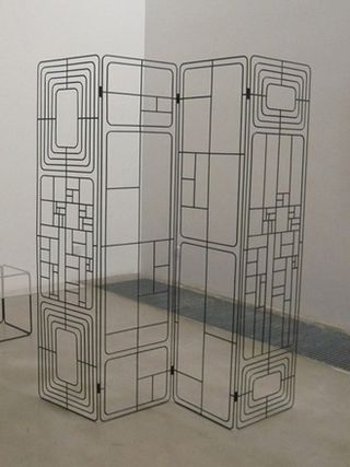 Four-panel transparent screen with geometric design