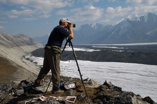 Ron Karpilo photographing a glacier