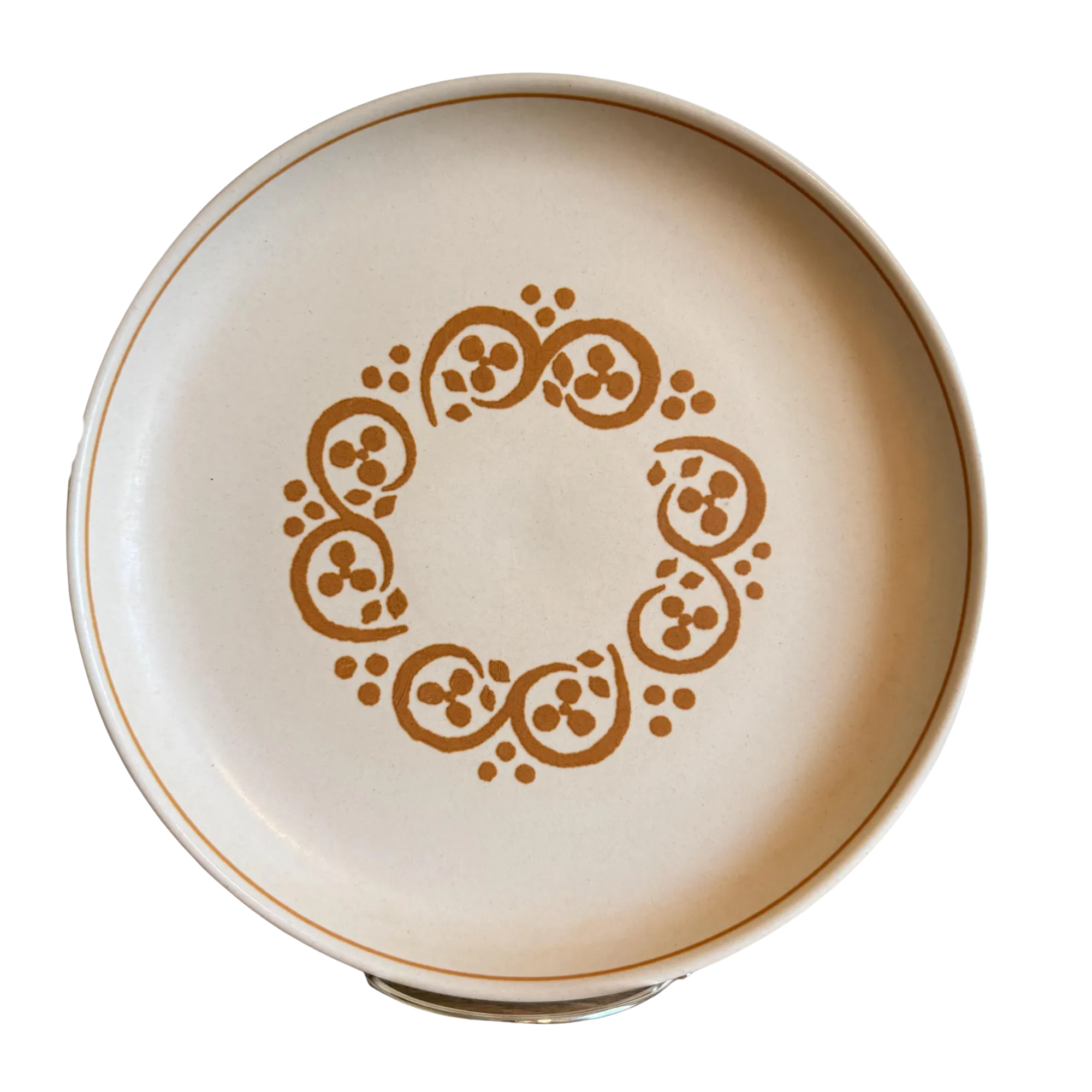 a vintage plate with a decorative design