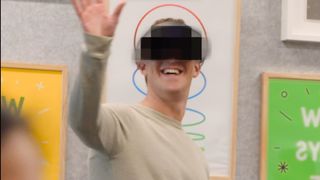 Mark Zuckerburg smiling with his hand up in VR that's been blurred out.