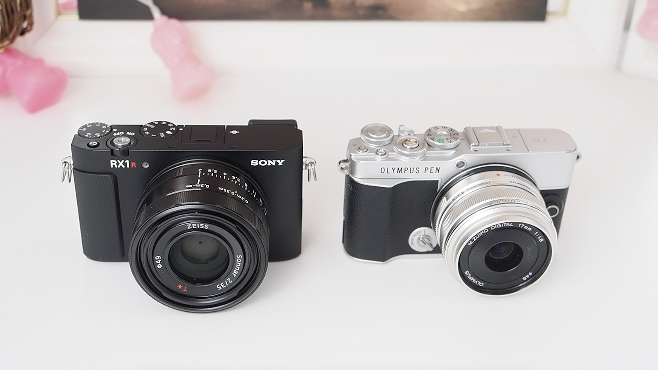 Sony RX1R III size comparison next to an Olympus PEN E-P7