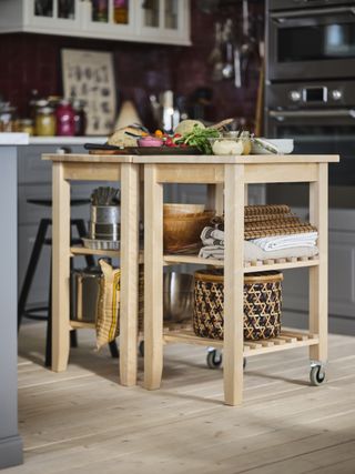 two butcher's trolleys pushed together, kitchen storage