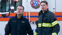 Don and Buck staring at something in front of an ambulance on 9-1-1: Nashville.