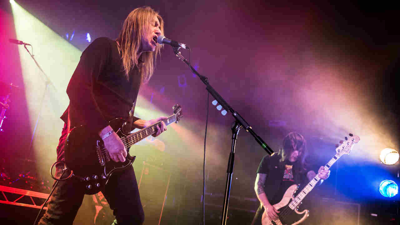 Angel Witch performing onstage in 2013