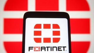 Fortinet logo of a cybersecurity company seen displayed on a smartphone screen.